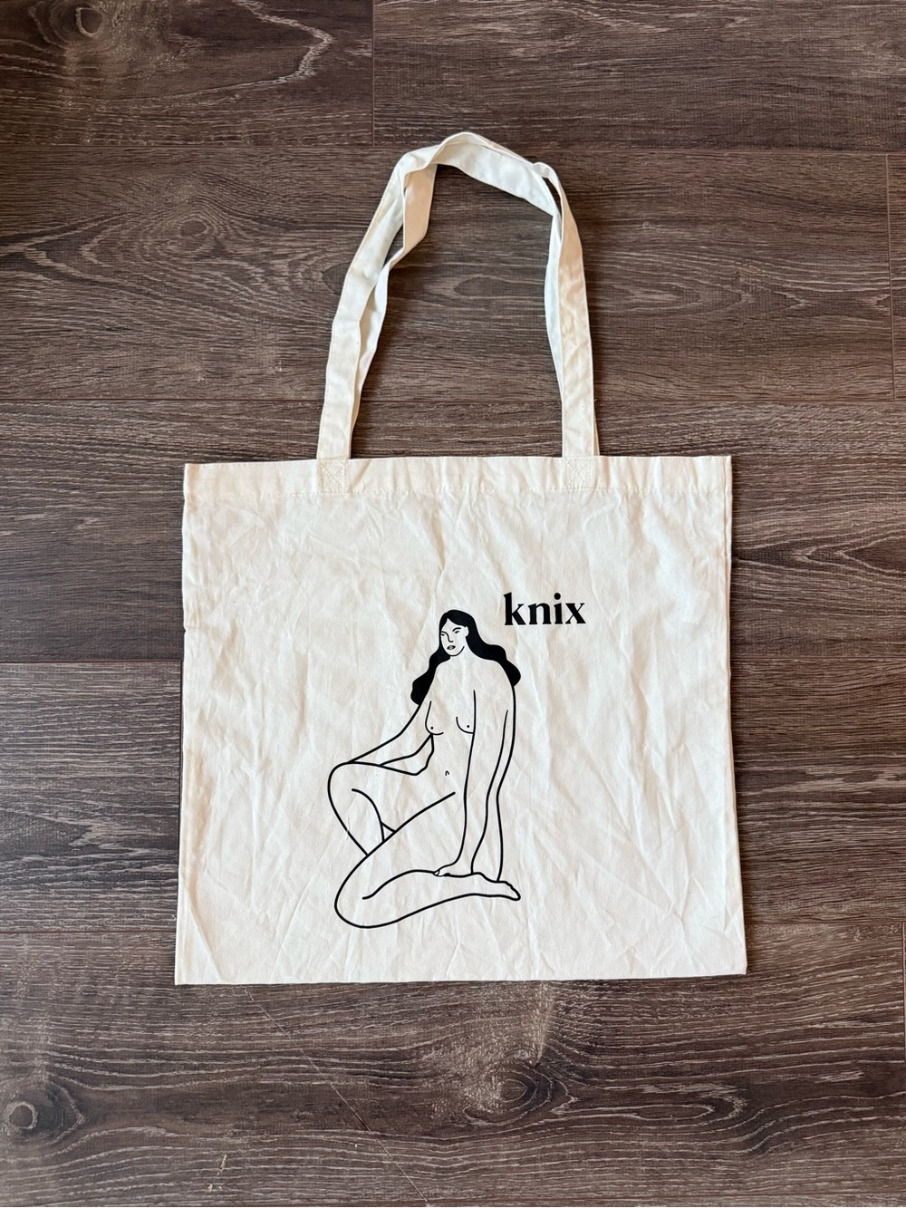 knix Cream Canvas Tote with Black Line Art Figure